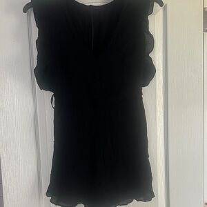 Black romper with pockets ruffled sleeves women’s xs